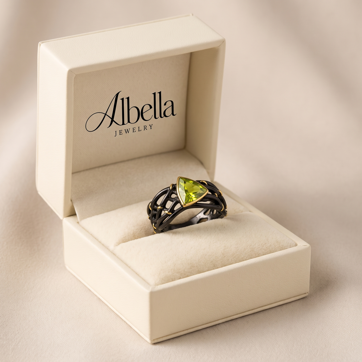 Braided Black Gold Ring with Green Gemstone in Albella Jewelry gift box