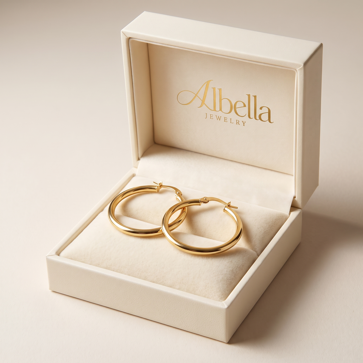 Large hoop earrings in gold in Albella Jewelry gift box