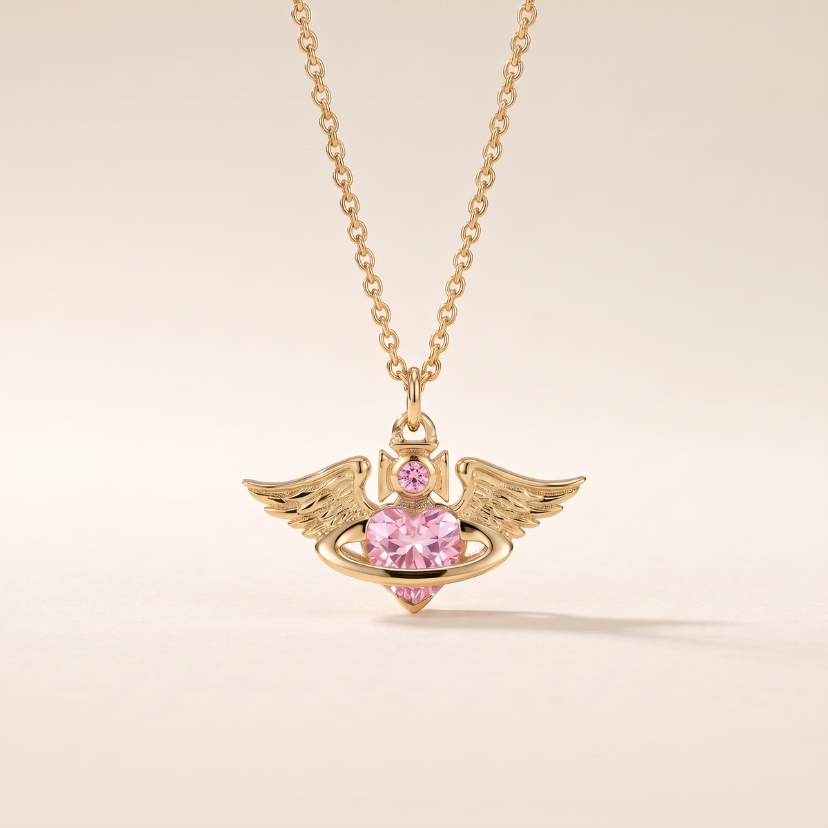 Winged Heart Crystal Orb Necklace – gold