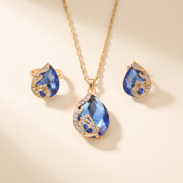Gold Necklace and Earring Set with Blue Crystal – Albella Jewelry