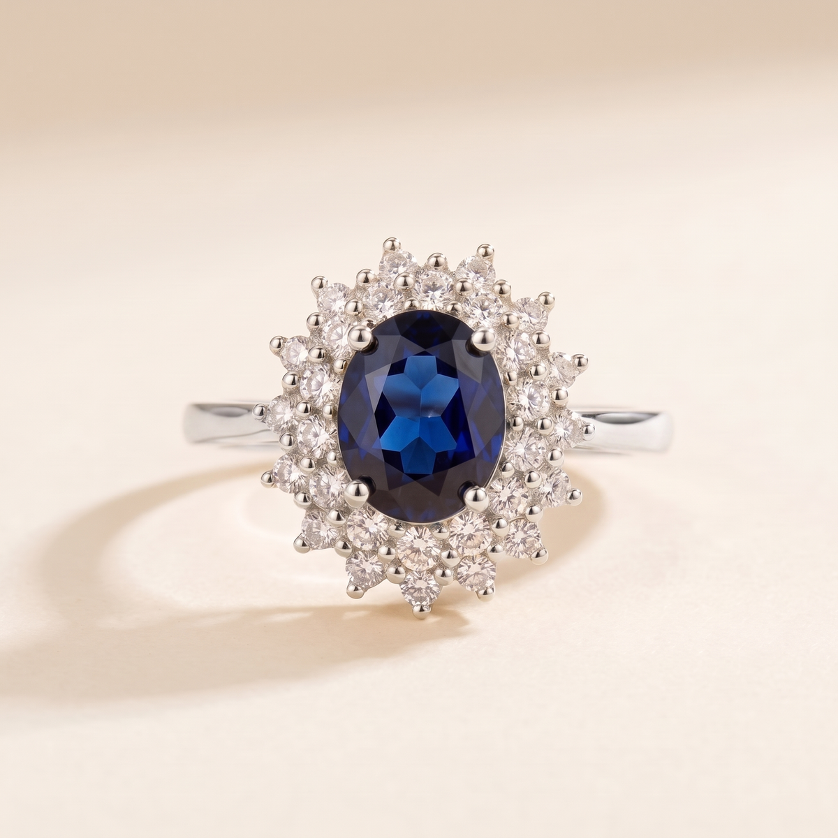 Elegant Sapphire Halo Ring – white gold